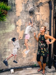 children playing basketball street art Penang