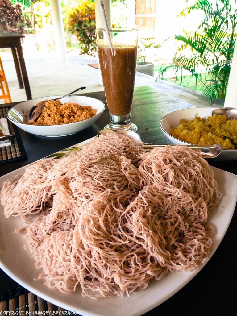 Sri Lankan breakfast - string hopper, dahl curry and woodapple juice