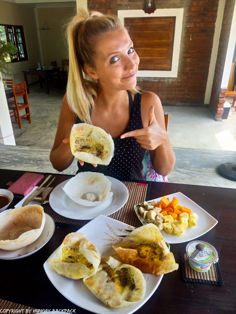 Sri Lanka breakfast_Berit enjoying Egg Hopper