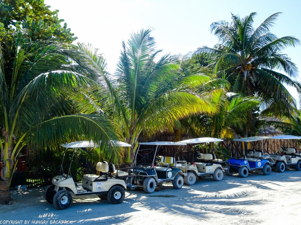Explore Holbox on a budget_golf cart queue