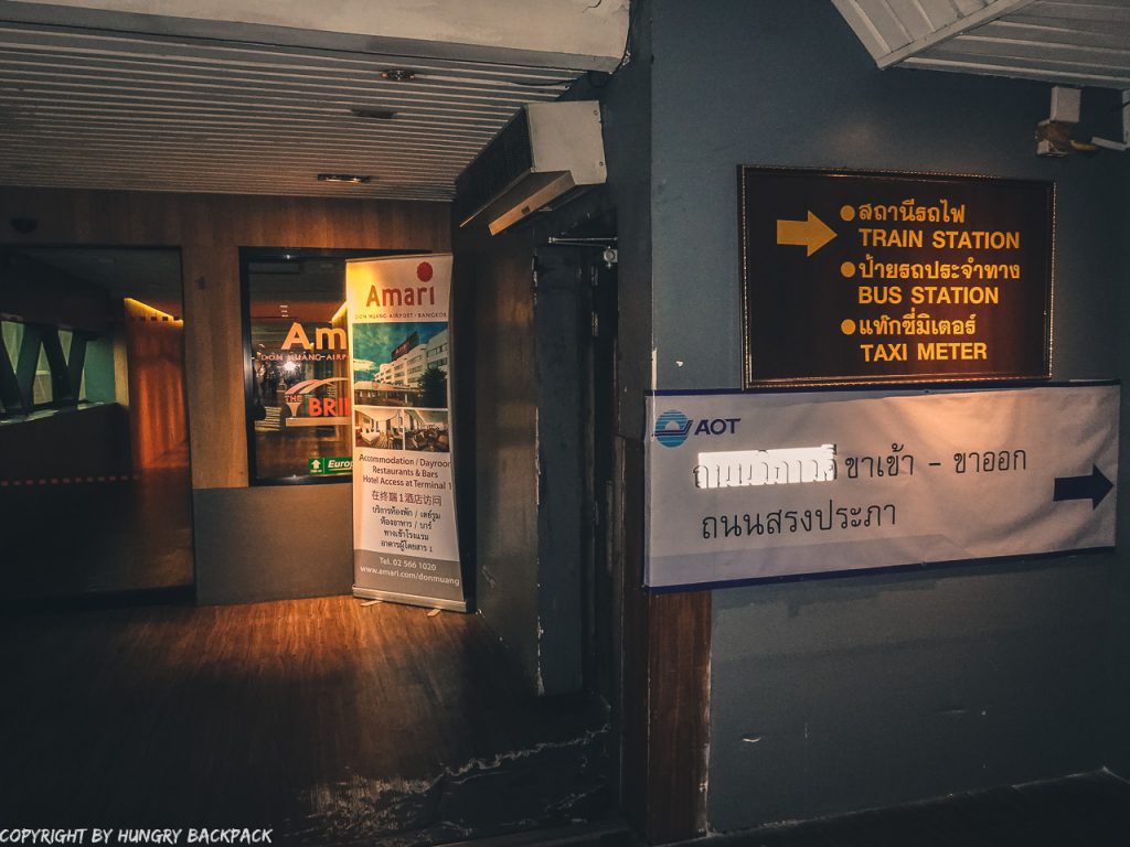 Don Mueang Airport to Bangkok City by train_door leading out to footpath from airport to train station