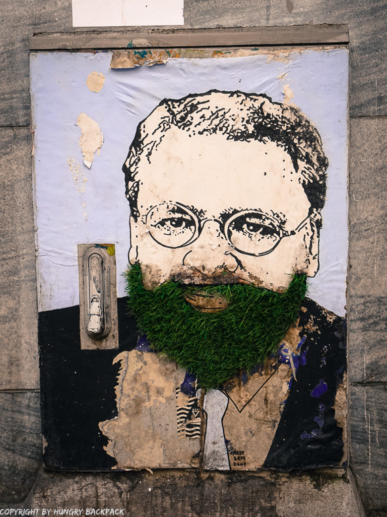 Porto street art_Rua de Miguel Bombarda_electrical box_man with grass beard