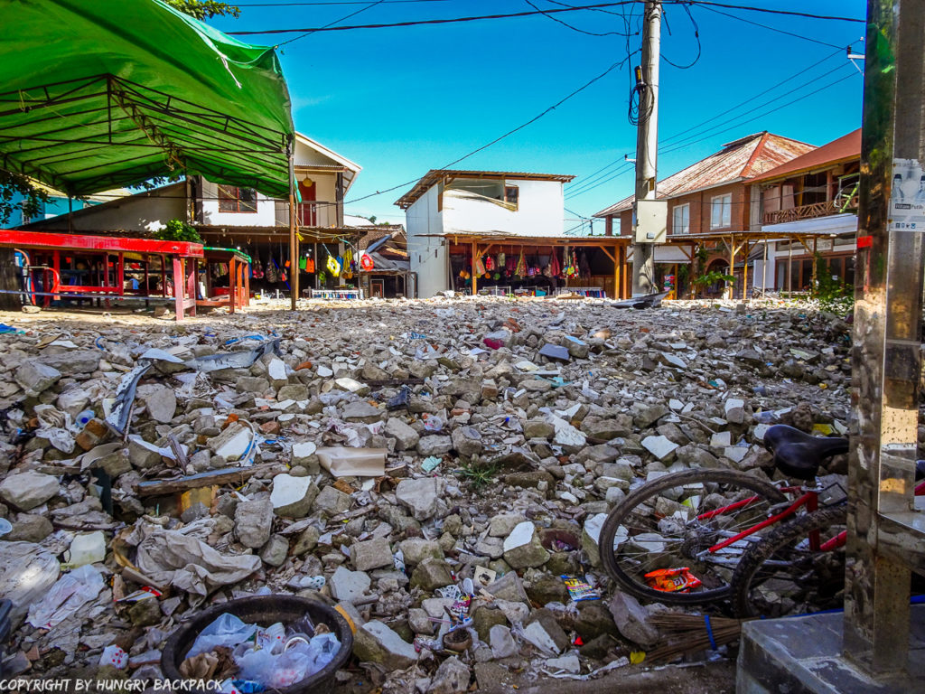 Gili Trawangan on year after earthquake_square of debris of collapsed building in center of town